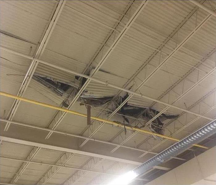 Warehouse roof caving in from storm