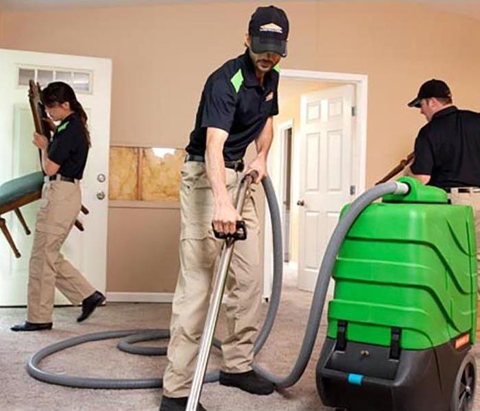 SERVPRO technicians performing cleaning services